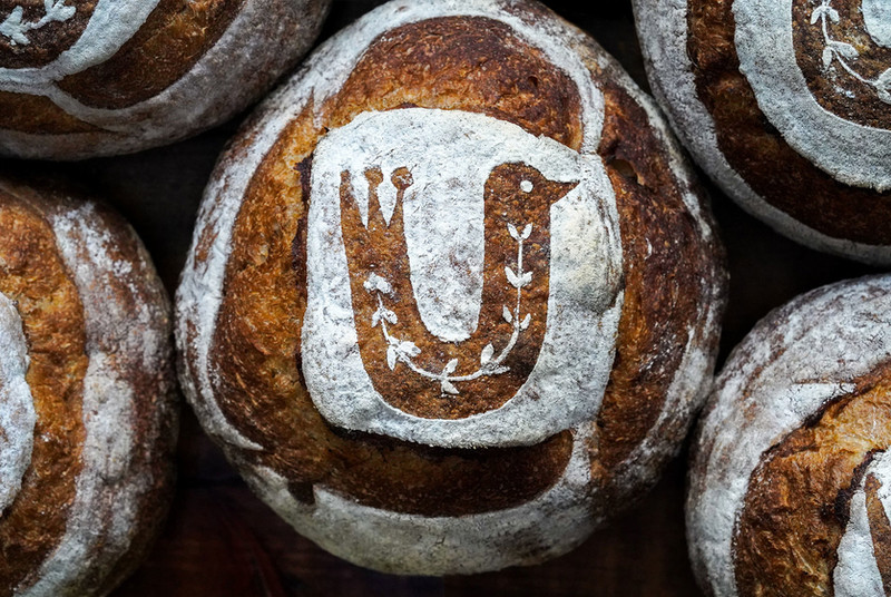 Sourdough loaves stamped with the Smør folk-bird